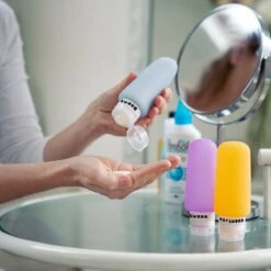 TRVLMORE Silicone Reisflesjes - Navulbaar - Handbagage - 100 ML - 3 Stuks - Oranje/Paars/Blauw -Verzorgings Producten Winkel 1200x1200 933